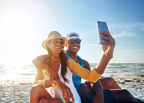 Couple sharing selfie on iphone